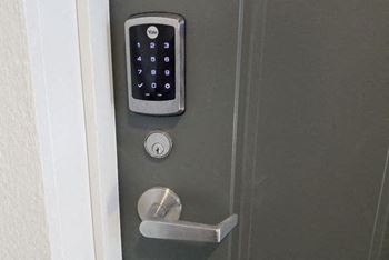 a door with a remote control on the front of it at Tanglewood Apartments, Wisconsin